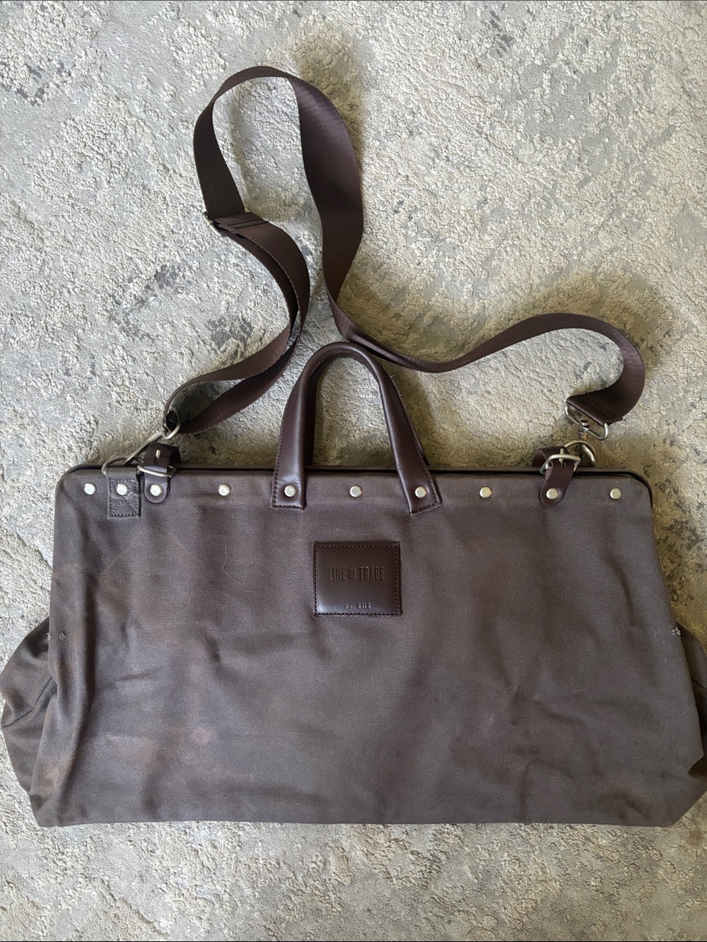 LINE OF TRADE Brown Canvas Travel Duffel with Leather Trim and Detachable Strap